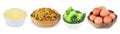 Colored pasta, chicken eggs, frozen broccoli and couscous  in a bowl isolated on a white background. Royalty Free Stock Photo