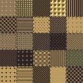 Colored patchwork quilt made of coffee and chocolate colored pieces