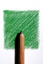 Colored pencil on green Royalty Free Stock Photo