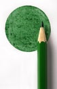 Colored pencil on green disk Royalty Free Stock Photo