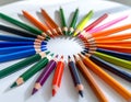 Colored pencils arranged in circular pattern Royalty Free Stock Photo