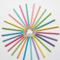 Colored pencils are arranged in a circular pattern on a white background Royalty Free Stock Photo