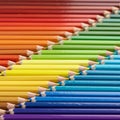 Colored pencils arranged in a diagonal pattern, creating a vibrant gradient from reds, Royalty Free Stock Photo