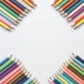 Colored pencils arranged in a diagonal pattern from the four corners of the image, Royalty Free Stock Photo