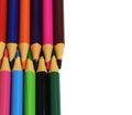 Colored pencils arranged head to head isolated on a white background. copy paste space Royalty Free Stock Photo
