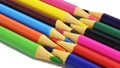 Colored pencils arranged head to head isolated on a white background. copy paste space Royalty Free Stock Photo