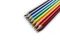 Colored pencils arranged in rainbow spectrum order