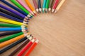 Colored pencils arranged in semi circle Royalty Free Stock Photo