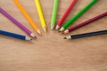 Colored pencils arranged in semi circle Royalty Free Stock Photo