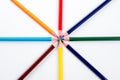 Colored pencils arranged in a star shape Royalty Free Stock Photo
