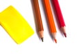 colored pencils in the basket, Eraser and pencil sharpener on white background Royalty Free Stock Photo