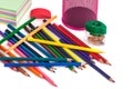 colored pencils in the basket, Eraser and pencil sharpener on white background Royalty Free Stock Photo