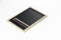 Colored pencils and black board Royalty Free Stock Photo