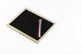 Colored pencils and black board Royalty Free Stock Photo
