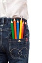 Colored pencils in child back pocket Royalty Free Stock Photo