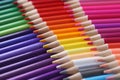 Colored pencils closeup. Collection of colored pencils in row