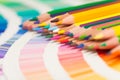 Colored pencils and color chart of all colors Royalty Free Stock Photo