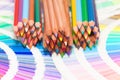 Colored pencils and color chart Royalty Free Stock Photo