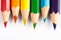 Colored pencils in the colors of rainbow on white background Royalty Free Stock Photo