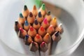 Colored pencils crayons close up sharpened rainbow many choice