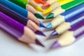 Colored pencils crossed on white background Royalty Free Stock Photo