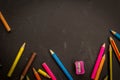 Colored Pencils, on dark background, may use as banner or slide Royalty Free Stock Photo