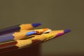 Colored pencils on a dark background. Retro style Royalty Free Stock Photo