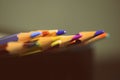 Colored pencils on a dark background. Retro style Royalty Free Stock Photo