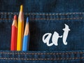 Colored pencils on denim. Lettering Art Royalty Free Stock Photo