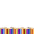 Colored pencils down line in shape of wave, border on white background Royalty Free Stock Photo