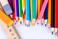 Colored pencils, eraser and ruler Royalty Free Stock Photo