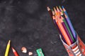 Colored pencils inside a shoe top view Royalty Free Stock Photo