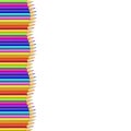 Colored pencils left side line in shape of wave, multicolored border Royalty Free Stock Photo