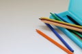 Colored pencils in a light blue pencil case Royalty Free Stock Photo