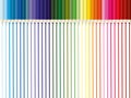 Colored pencils, lots of colors, the view from above. The pencils are arranged exactly in a row, with drawn lines of each color Royalty Free Stock Photo