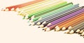 Colored pencils lying in irregular row Royalty Free Stock Photo