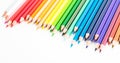 Colored pencils lying in irregular row Royalty Free Stock Photo