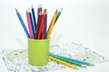 Colored pencils and ornament. Royalty Free Stock Photo