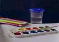 Colored pencils, paint and brush for children`s creativity Royalty Free Stock Photo