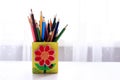 Colored pencils in a pencil case on white background Royalty Free Stock Photo