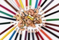 Colored pencils, pencil shavings and pencil sharpener Royalty Free Stock Photo