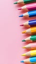 Vibrant Colored Pencils on Pink Background. Royalty Free Stock Photo
