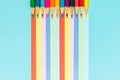 Colored pencils and rainbow colorful stripes