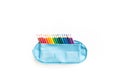 Colored pencils rainbow. School pencil case. White background Royalty Free Stock Photo