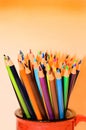 Colored pencils in red mug Royalty Free Stock Photo