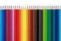Colored pencils in a row, isolated Royalty Free Stock Photo