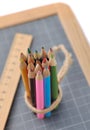 Colored pencils, rule and slate Royalty Free Stock Photo