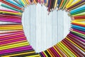 Colored pencils shaped heart symbol Royalty Free Stock Photo