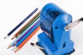 Colored pencils and sharpener Royalty Free Stock Photo