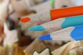 Colored pencils and shavings from sharpening Royalty Free Stock Photo